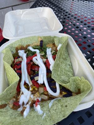 Burrito bowl (vegan ingredients: refried beans, veggies, vegan sour cream and queso, tortilla chips, in a spinach tortilla)  at Unity Taqueria in Philadelphia