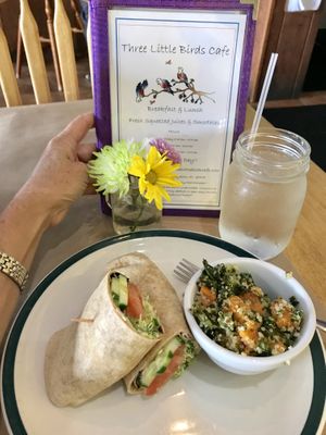 Hummus & veggie wrap w/ quinoa,kale,sweet potato side. Very good. I’ll be back. at Three Little Birds Cafe in Charleston