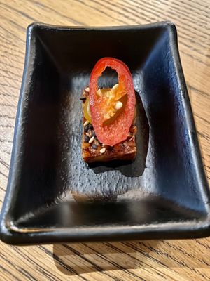 Amuse from the house: crunchy tempeh with passionfruit sauce  at Lazytiger in Ermelo