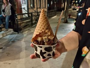Vanilla soft serve, cookie dough, brownie bites, and a waffle cone on top at Vaca's Creamery in Chicago