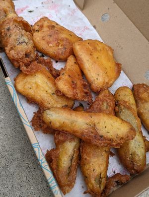 Battered sausage, miso tofu and gherkins at Beach Buoys in Margate