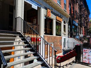Stairs leading up to Szechuan Mountain House from sidewalk at Szechuan Mountain House in New York City