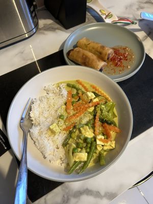 Green curry, jasmine rice, veggie spring rolls  at Udon Thai Street Food in Leven
