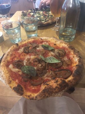 Parmigiana party pizza and my partner got the pesto one, both so good!  at Purezza in Manchester