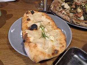 Garlic and rosemary flatbread at Purezza in Manchester