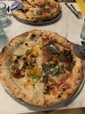 one with nduja( left) and all day parmigiana party(right)  at Purezza in Manchester