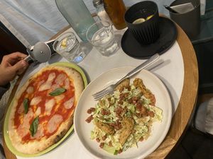 “Chicken” ceasar salad and   pizza!   at Purezza in Manchester