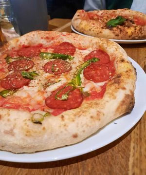 Pepperoni (front) and parmigiana (back) at Purezza in Manchester