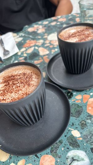 Hot chocolate oat milk   at Purezza in Manchester
