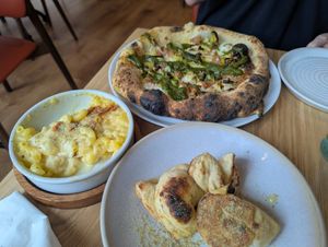 Dough balls, Mac and cheese and a fennel sausage and leek pizza at Purezza in Manchester