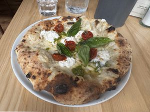 miso pesto pizza. it was good, though note the large amount of crust  at Purezza in Manchester