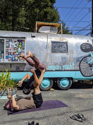acroyoga with zucchini kill cupcakes (a Yacht dessert option) at The Vegan Yacht in Austin