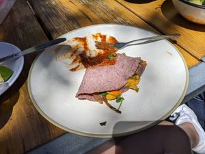 Mostly eaten (more than half gone) quesadilla de flor de calabaza at Nido's Backyard in Oakland