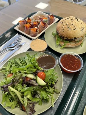 Side garden salad, rainbow rolls, the loaded vegan 2.0 burger  at Gaia's Urban Eatery in Charlottetown