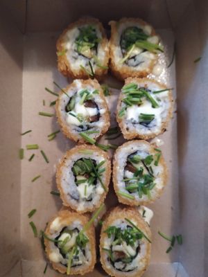 Tempura sushi with salmon and sauce hollandaise at Loco Sushi in Hamburg