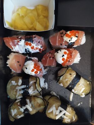 Vegan salmon and caviar and fried eggplant with vegan feta onigiris, with pickled mango stripes at Loco Sushi in Hamburg