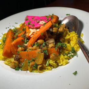Moroccan Veggie Tagine:  Carrots, Chickpeas, Raisins, Onions with Ginger, Cinnamon, Cilantro, Garlic & Spices at Zooroona Restaurant and Lounge in Kalamazoo