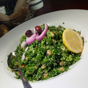 Large Tabbouleh:  Fresh Parsley, Diced Tomato, Cucumber, Green Onion, Bulgur Wheat, Mint, Lemon Juice and Olive Oil at Zooroona Restaurant and Lounge in Kalamazoo