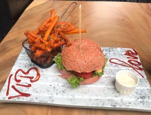Avocado burger and sweet potato fries  at Vegan Temple Bar in Amsterdam