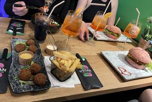 vegan bitterballen, fries, rainbow falafel bowl & 2 "chicken" burgers  at Vegan Temple Bar in Amsterdam