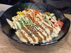 Chicken avocado bowl with sriracha sauce   at Vegan Temple Bar in Amsterdam