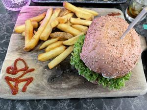 L’italiano Burger with homemade fries  at Vegan Temple Bar in Amsterdam
