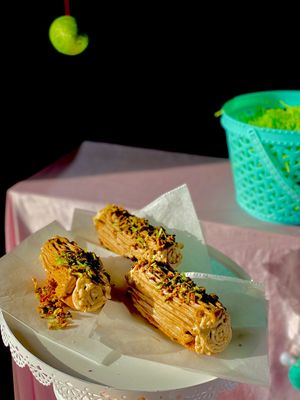 Something I call Mossy Logs, they’re filled with a seasonal flavored cream, and then covered in buttercream, then topped with coconut moss at The Indignant Platypus in Louisville