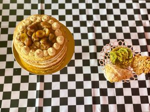 Caramelized Banana cake, apple pie scone, kiwi tartlet, cornflake crisp cookie  at The Indignant Platypus in Louisville