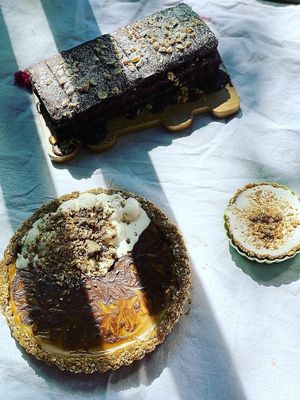 Peanut trio! Peanut butter Marshmallow brownie stack, peanut butter chocolate tart, and a mini one to match! at The Indignant Platypus in Louisville