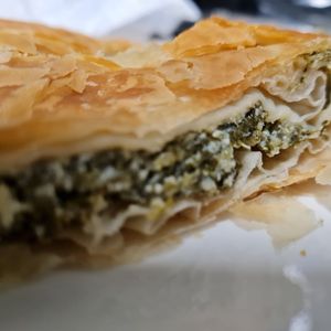 vegetarian spinach and feta pastries  at Delphine's Kitchen in Sheffield