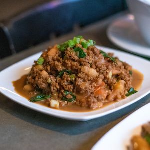 Vegan Thai Basil:  Beyond Meat sauteed with basil, tomatoes, lime, Thai Chili, soy sauce and mirin. at Uptown China Restaurant in Seattle