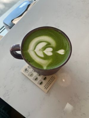 Matcha latte above at Whisk Matcha Cafe in Vancouver