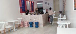 Inside 30 sits at Charli's Crew in Paris