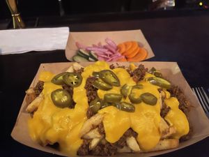 Vegan chilli cheese fries + pickled veggies   at The Vanguard in Milwaukee