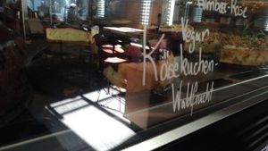 Labelled well raspberry rose at Kaffeehaus in Luebeck