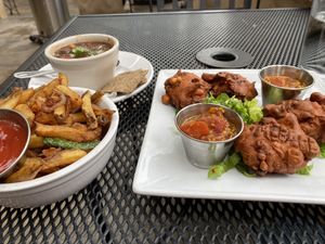 Black bean, sweet potato stew, pakoras, fries   at Laughing Seed Cafe in Asheville