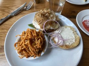 5/5 veggie burger with added onions and vegan cheese soooooo good. The kimchi ramen was 3/5    at Laughing Seed Cafe in Asheville