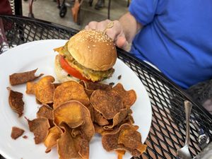 Veggie burger and chips  at Laughing Seed Cafe in Asheville