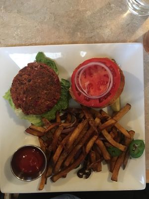 The seed burger with onion and jalapeño fries at Laughing Seed Cafe in Asheville