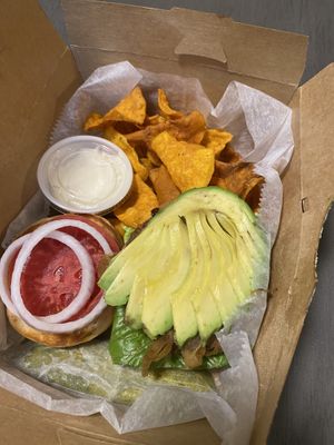 Seed burger with sweet potato chips at Laughing Seed Cafe in Asheville