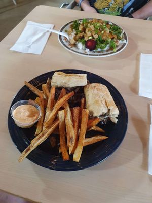 My partner's cheesesteak (ordered with mushrooms instead of beef) and my 'gingy' bowl were both huge hits. Very flavorful at Kettle Lake Kitchen in Meadville