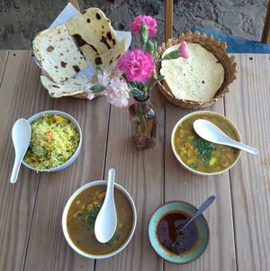 Chickpea curry, mixed vegetables curry, basmati rice , Naan and Pappadam - Indian flatbreads at Tara Indian Food in Tepoztlan