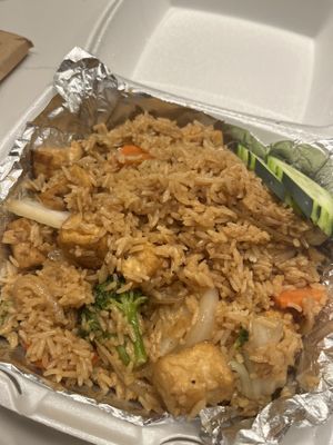 Basil fried rice with tofu - warm raw cucumber as a garnish   at My Thai & Vegan in Irving