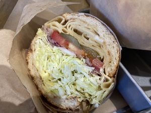 Cubano - Slow-roasted warm citrus and garlic seitan, mayo, mustard, cabbage, tomato, pickle, onion on a toasted torpedo roll.  at Chef Tanya's Kitchen in Palm Desert