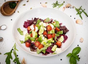 Egea Salad.
Tomatoes, cucumber, red onions, homemade vegan mozzarella cheese, Kalamata black olives, basil, extra-virgin olive oil. at Fellini in Siem Reap