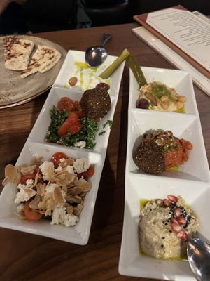 The appetizer combo the top and bottom left are not vegan but the other four are (all are veg)  at DishDash in Sunnyvale