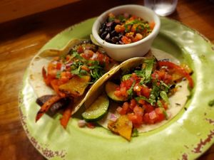 Grilled veggie tacos with rice and beans at Roosters in Mobile