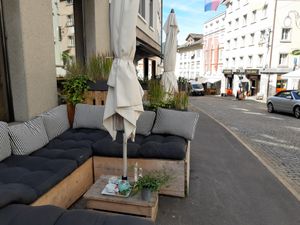 Outdoor seating at Kaffeehaus zu den Drei Herzen in Einsiedeln
