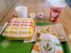 With a strawberry milkshake at Plant Power Fast Food in Sacramento