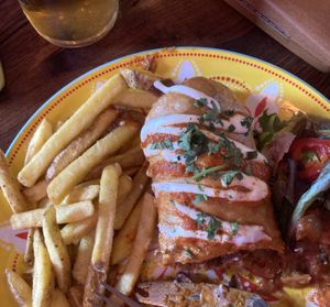 No beef chimichanga ( this is only half of it as my husband ate half before I took the picture 🤣)  at Mexicali in Holmfirth